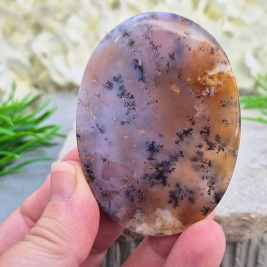 Merlinite Palm Stone - a grounding and intuitive crystal for meditation, inner balance and spiritual work. Smooth pocket stone for daily calm energy.