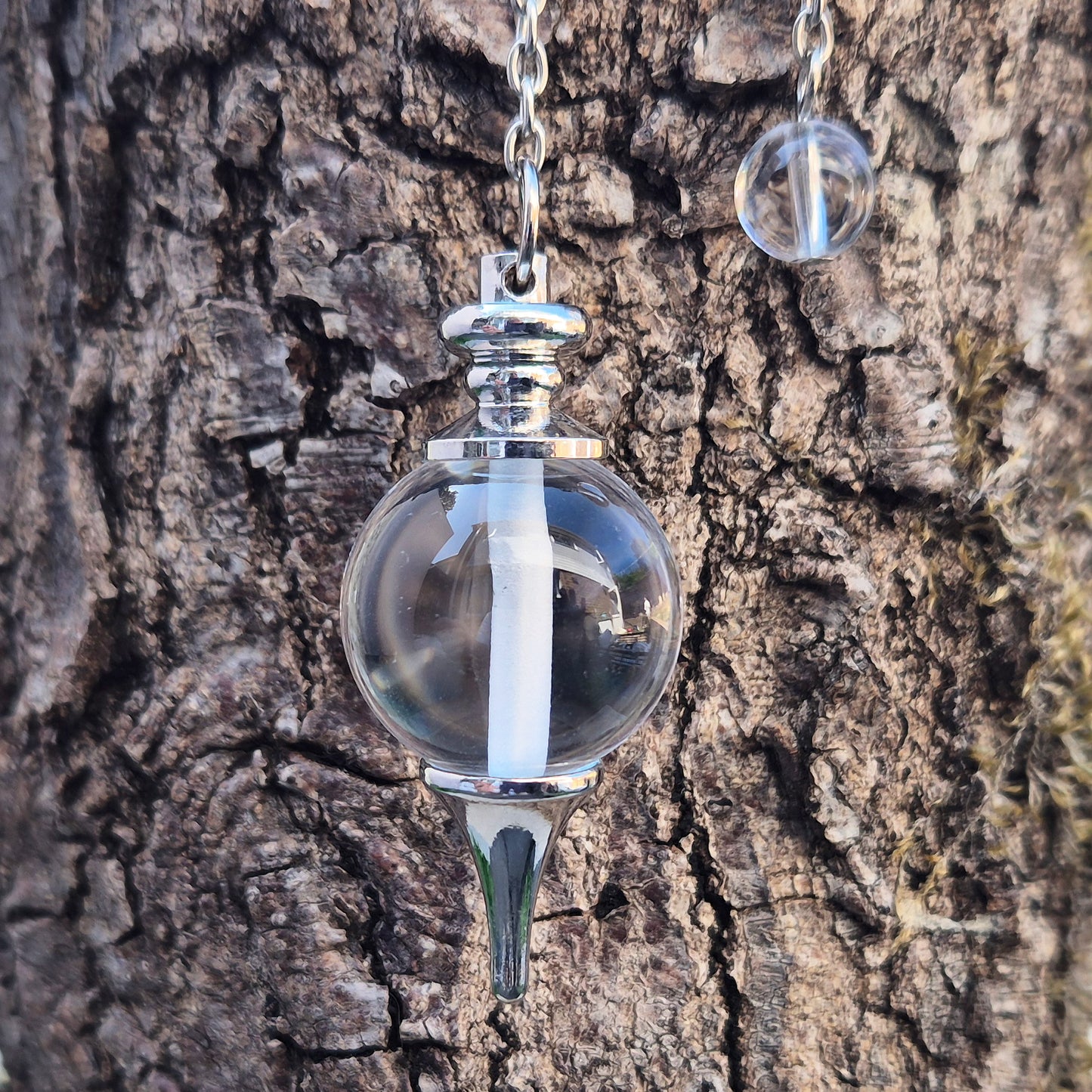Clear Quartz crystal pendulum for divination, dowsing, and intuitive guidance. A versatile stone for clarity, focus, and balanced energy. 