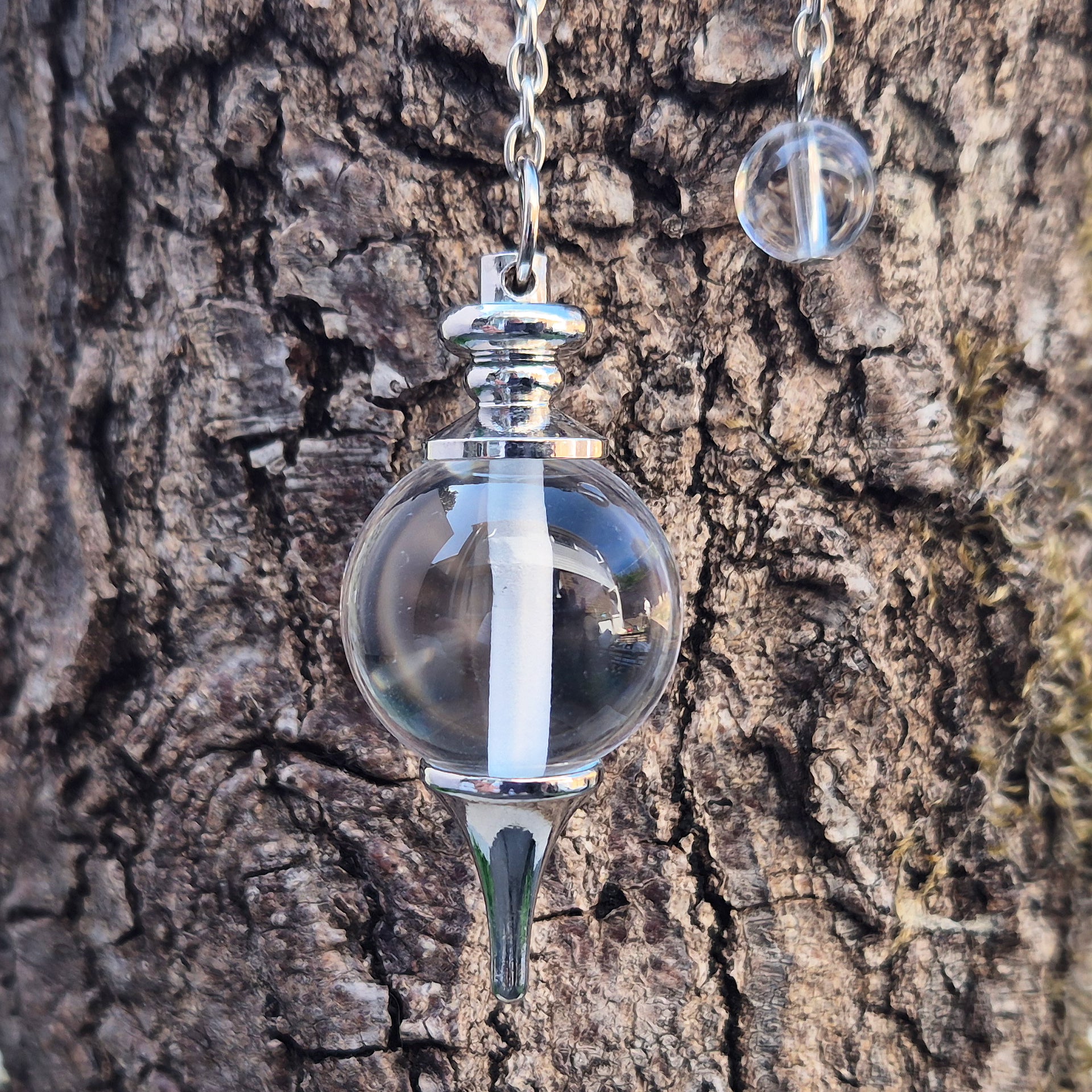 Clear Quartz crystal pendulum for divination, dowsing, and intuitive guidance. A versatile stone for clarity, focus, and balanced energy. 