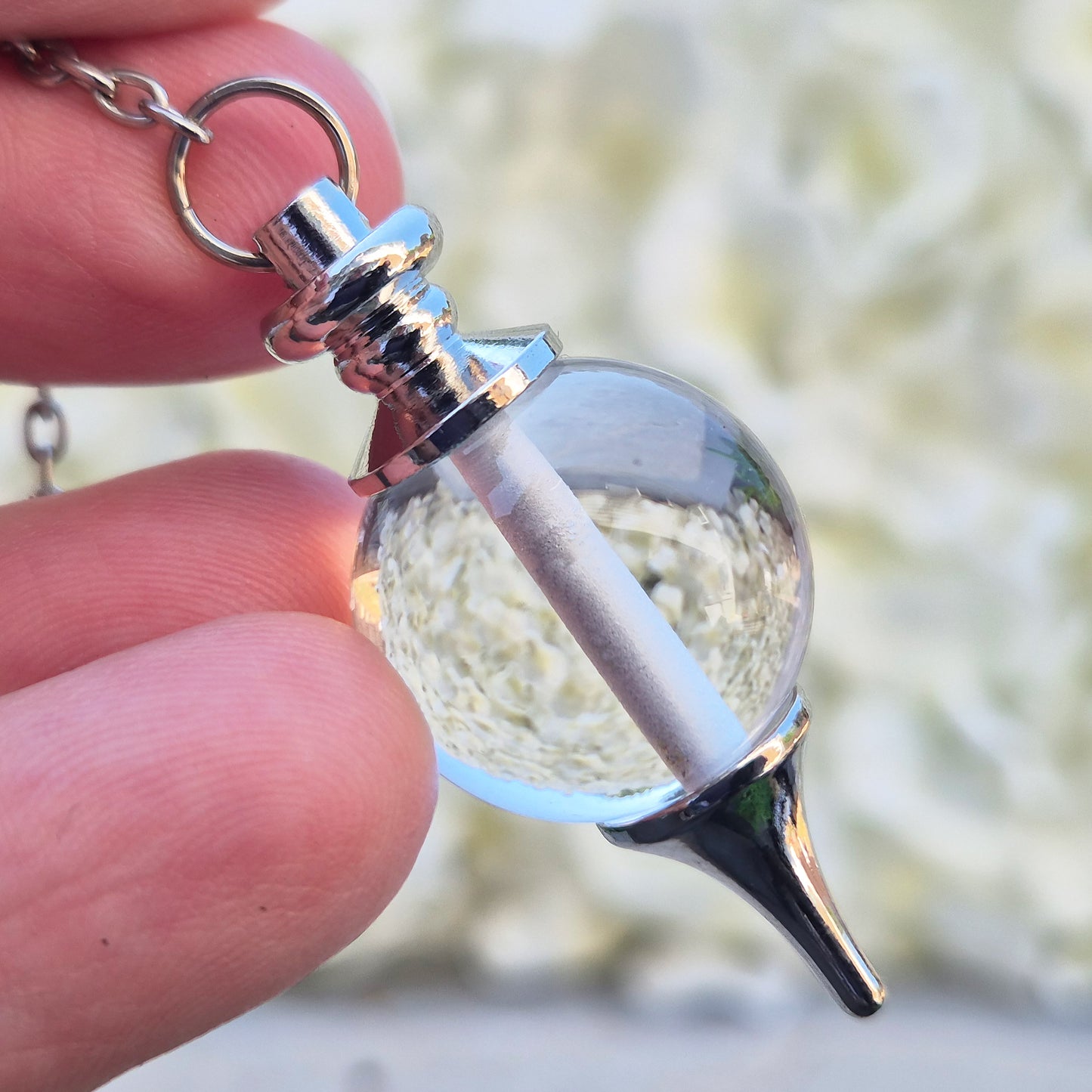 Clear Quartz crystal pendulum for divination, dowsing, and intuitive guidance. A versatile stone for clarity, focus, and balanced energy. 