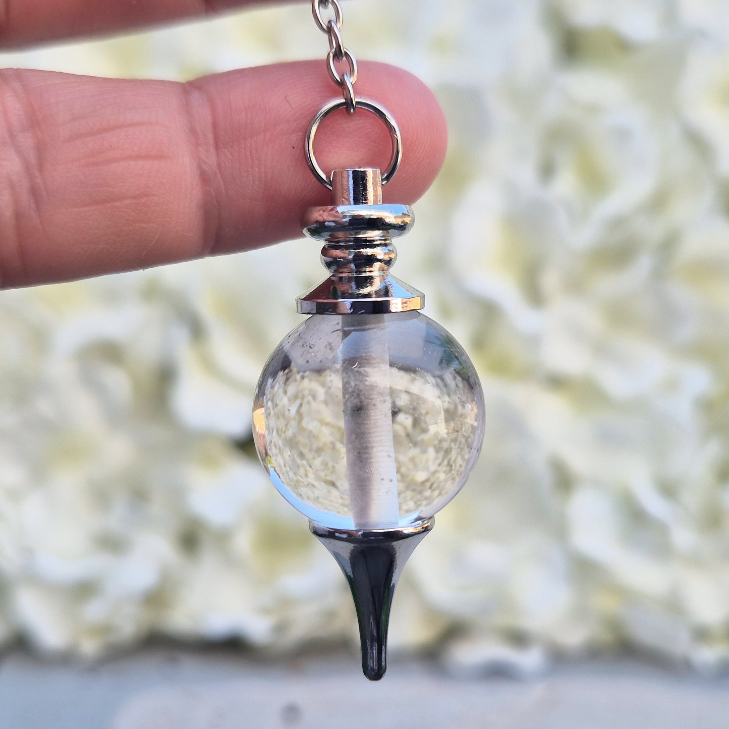 Clear Quartz crystal pendulum for divination, dowsing, and intuitive guidance. A versatile stone for clarity, focus, and balanced energy. 