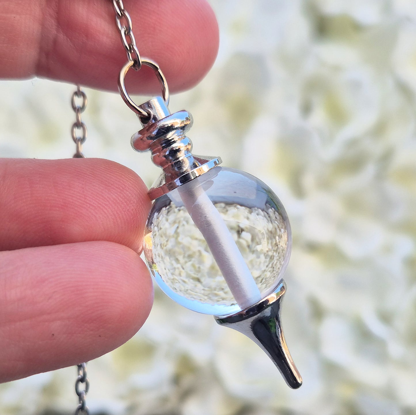Clear Quartz crystal pendulum for divination, dowsing, and intuitive guidance. A versatile stone for clarity, focus, and balanced energy. 