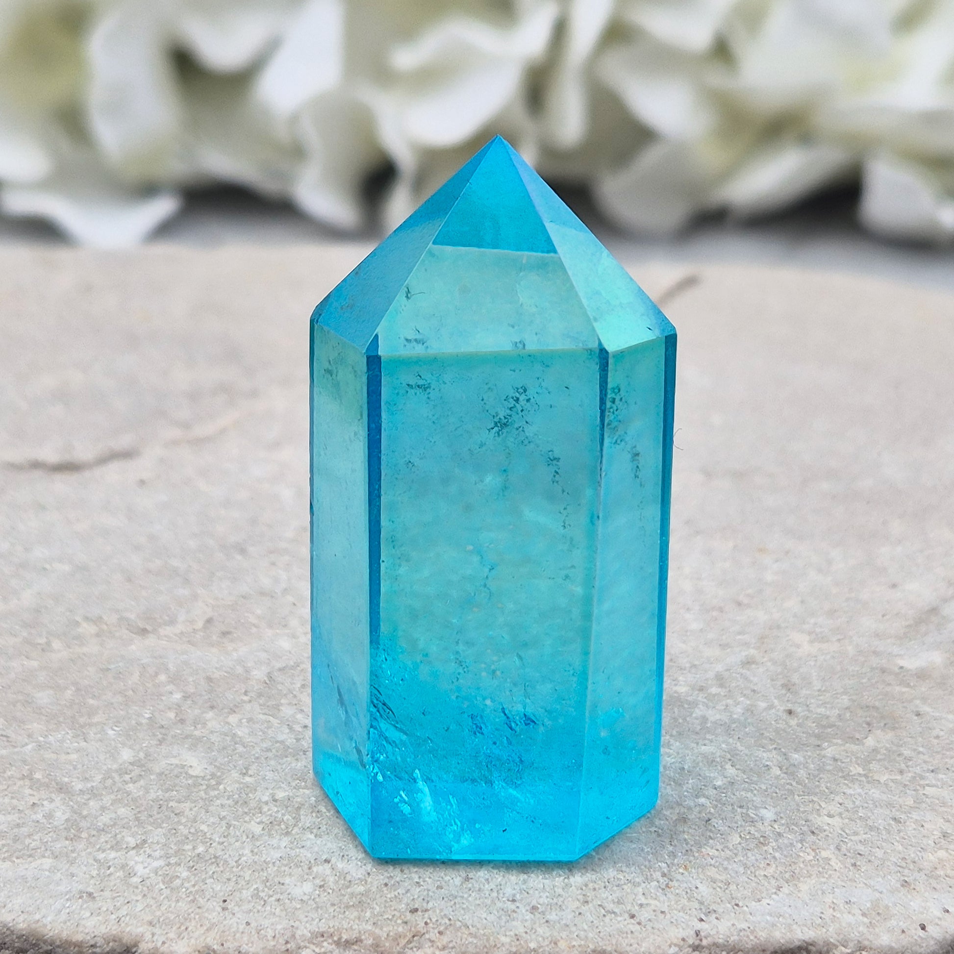 Striking Aqua Aura Point from Brazil. Gold-bonded Quartz for clarity, calm, and communication. High-vibe crystal to uplift and soothe the aura. 