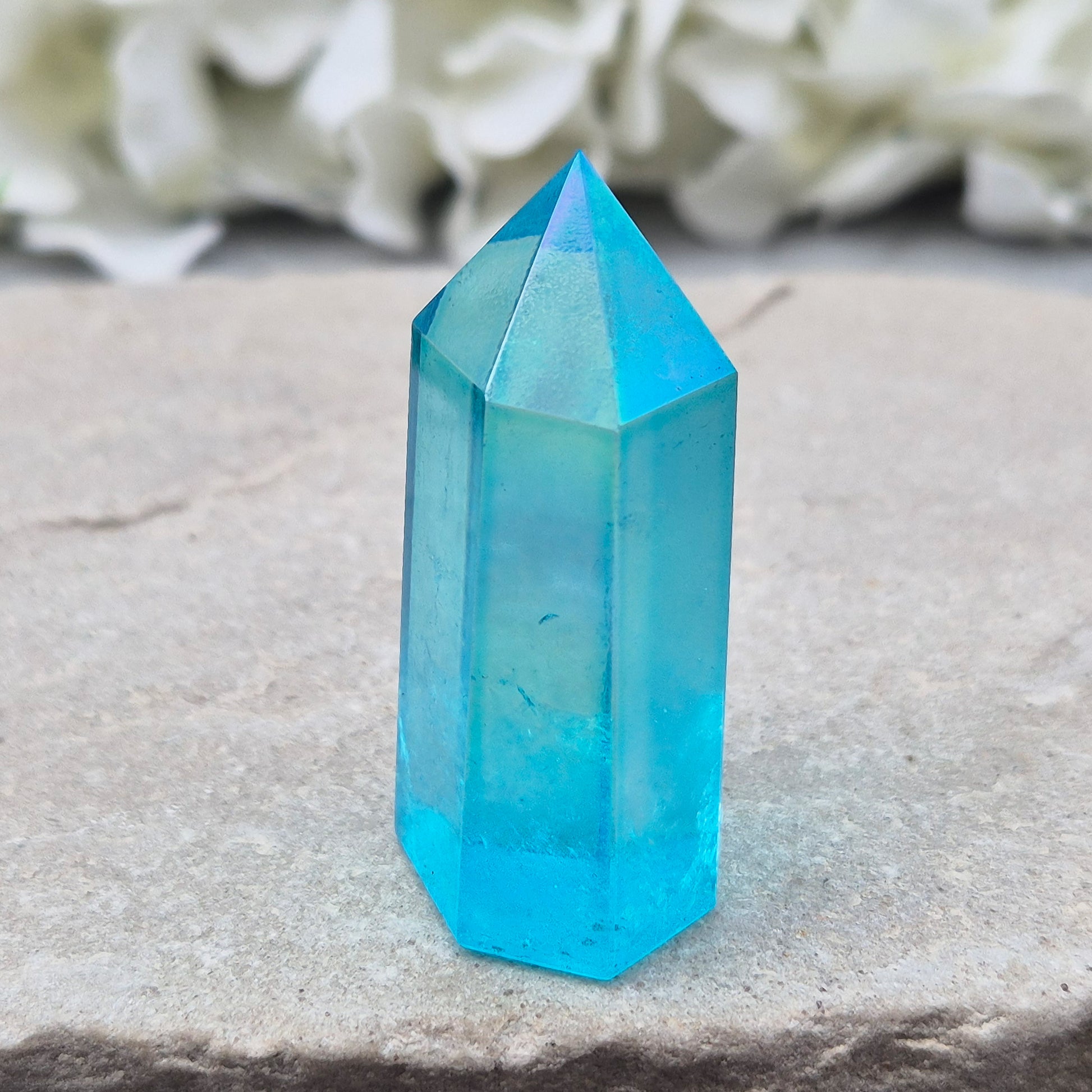 Striking Aqua Aura Point from Brazil. Gold-bonded Quartz for clarity, calm, and communication. High-vibe crystal to uplift and soothe the aura. 