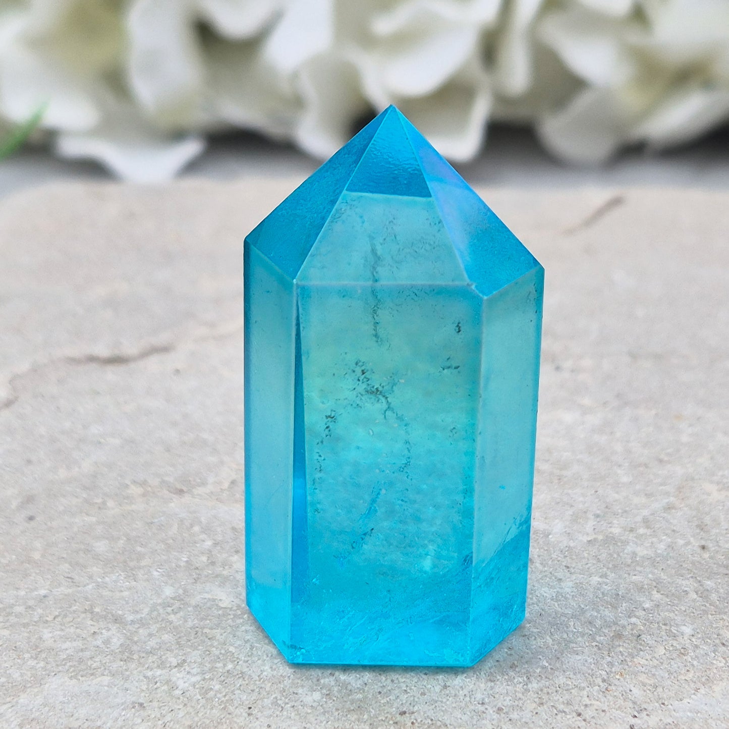 Striking Aqua Aura Point from Brazil. Gold-bonded Quartz for clarity, calm, and communication. High-vibe crystal to uplift and soothe the aura. 