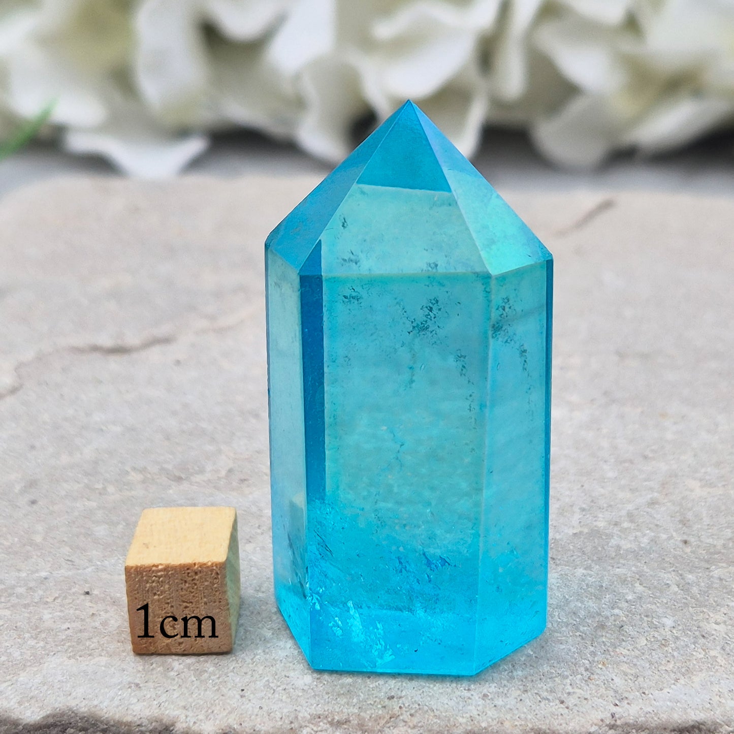 Striking Aqua Aura Point from Brazil. Gold-bonded Quartz for clarity, calm, and communication. High-vibe crystal to uplift and soothe the aura. 