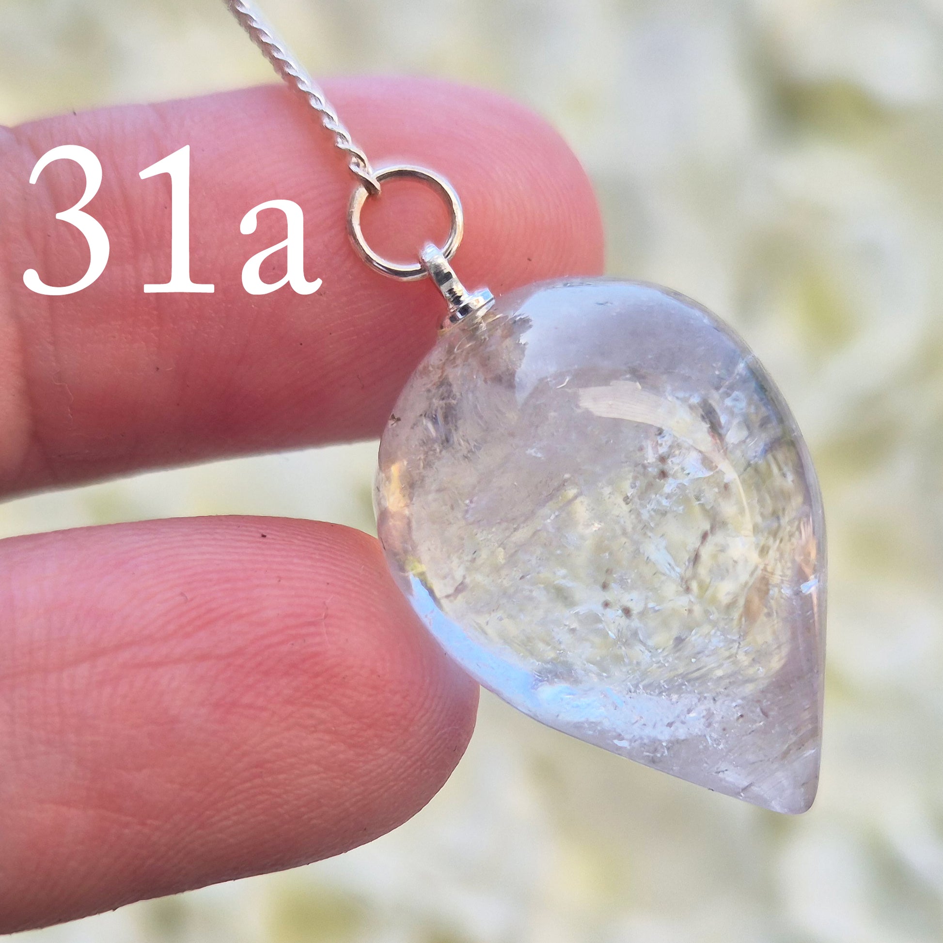 This Clear Quartz Crystal Pendulum from Brazil features a tear drop crystal shape and at the end of the chain is a clear bead. It will come with a pouch for safe keeping.
