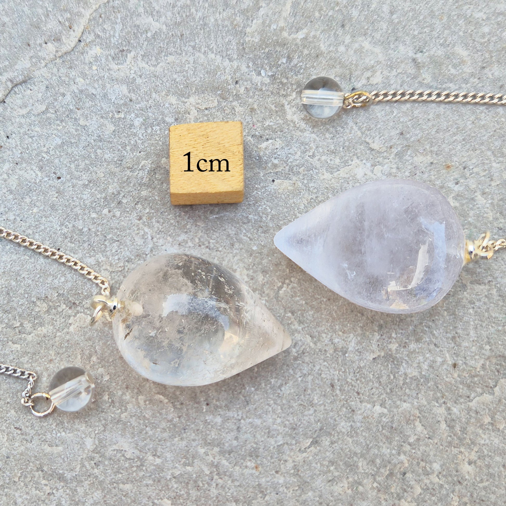 This Clear Quartz Crystal Pendulum from Brazil features a tear drop crystal shape and at the end of the chain is a clear bead. It will come with a pouch for safe keeping.