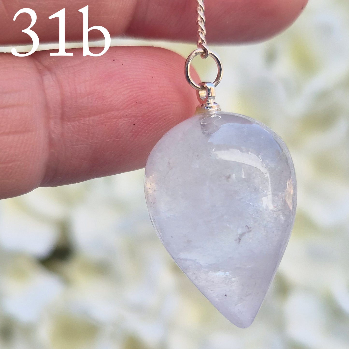 This Clear Quartz Crystal Pendulum from Brazil features a tear drop crystal shape and at the end of the chain is a clear bead. It will come with a pouch for safe keeping.