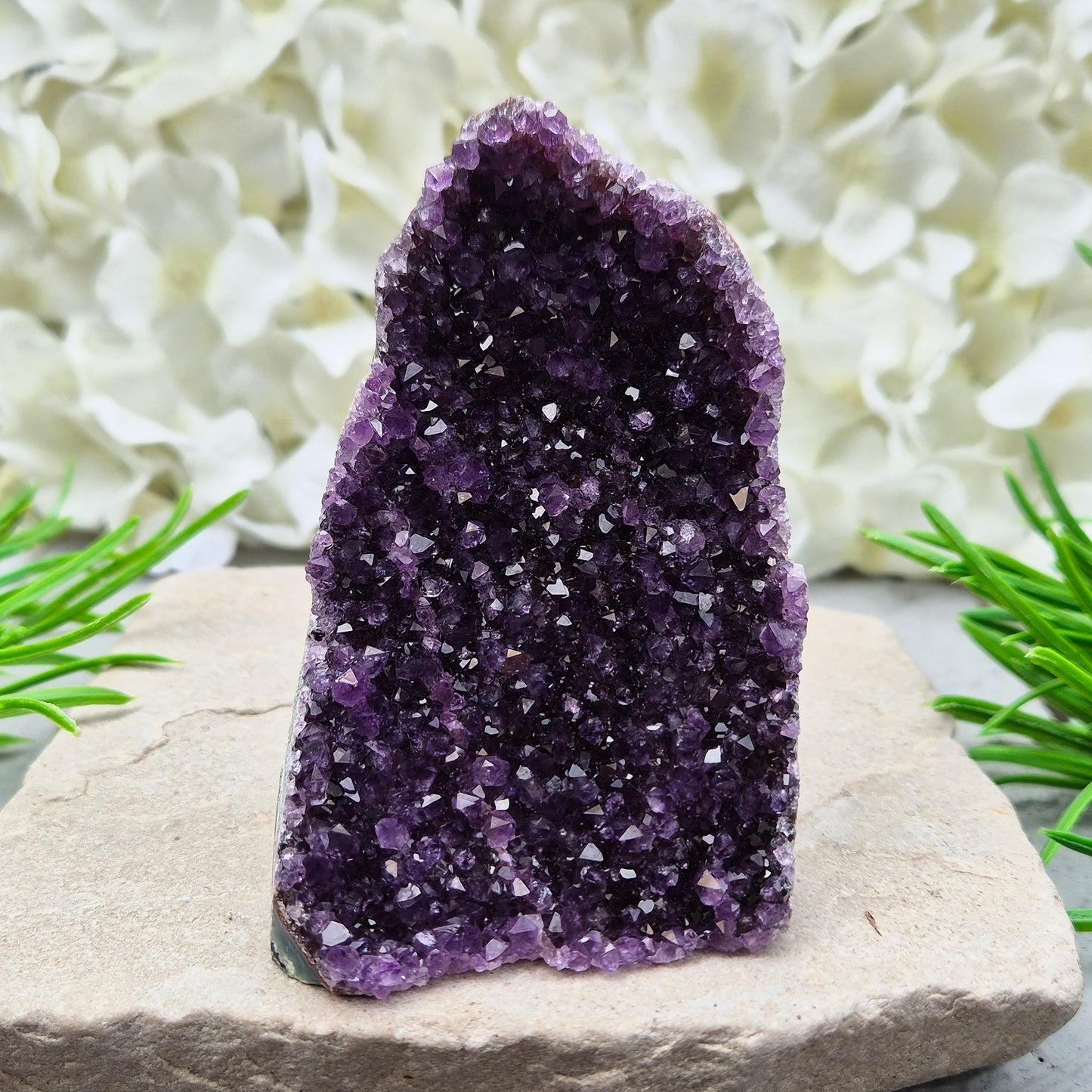 Natural Amethyst geode with deep purple crystals. Ideal for calming spaces, meditation, or display. Cleansed and ready to bring peaceful energy. 