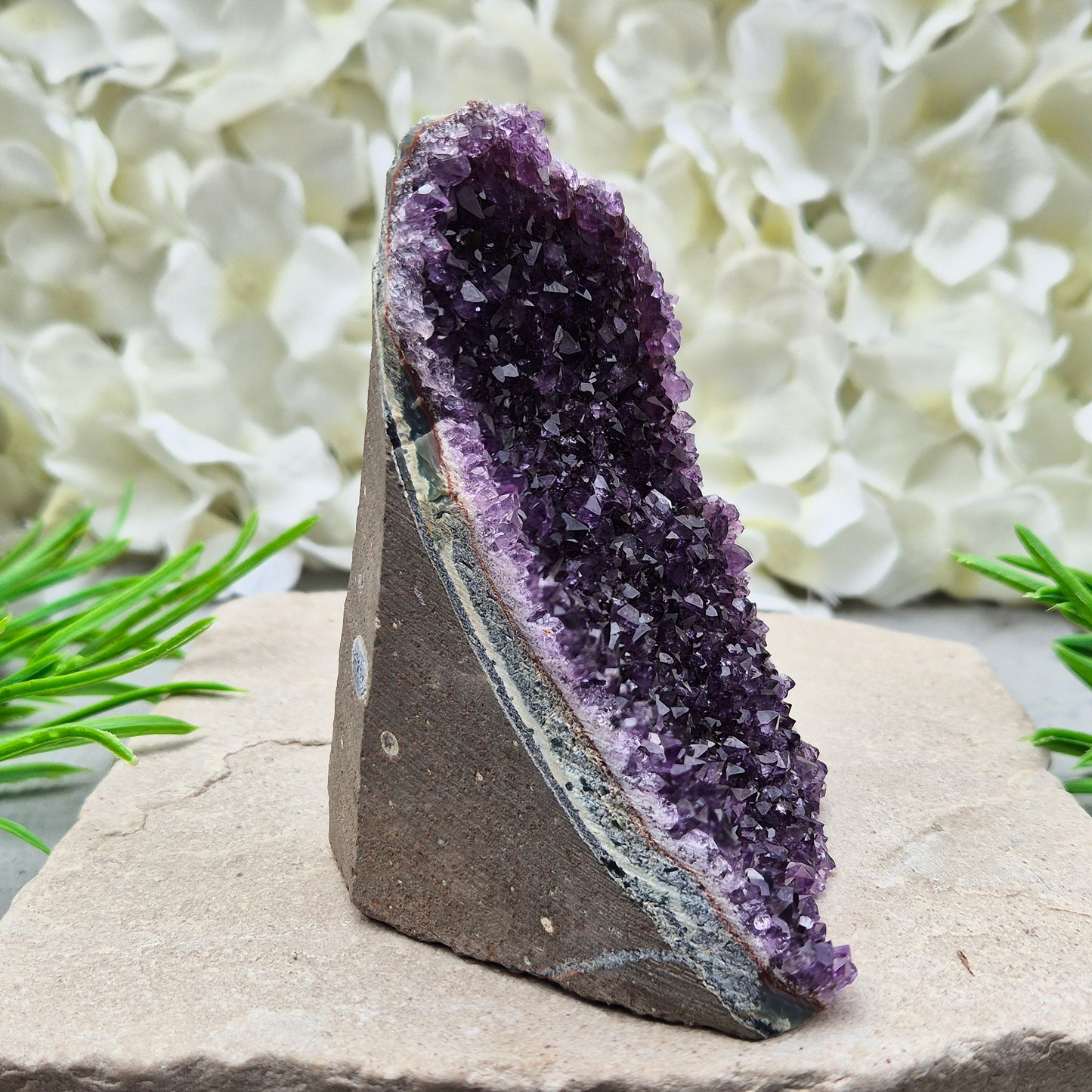 Natural Amethyst geode with deep purple crystals. Ideal for calming spaces, meditation, or display. Cleansed and ready to bring peaceful energy. 