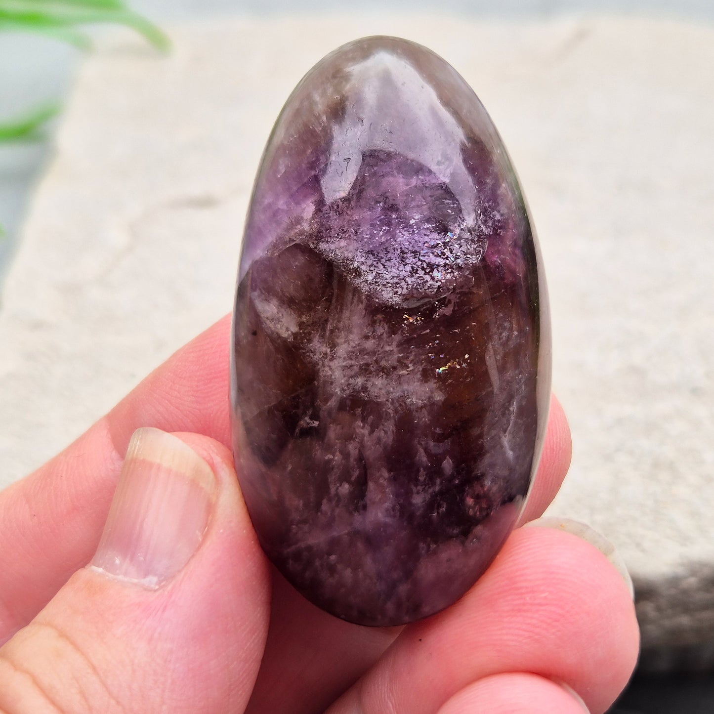 Ametrine polished palm stone with soft purple and golden tones. A natural blend of Amethyst and Citrine with a balanced, easy feel. 