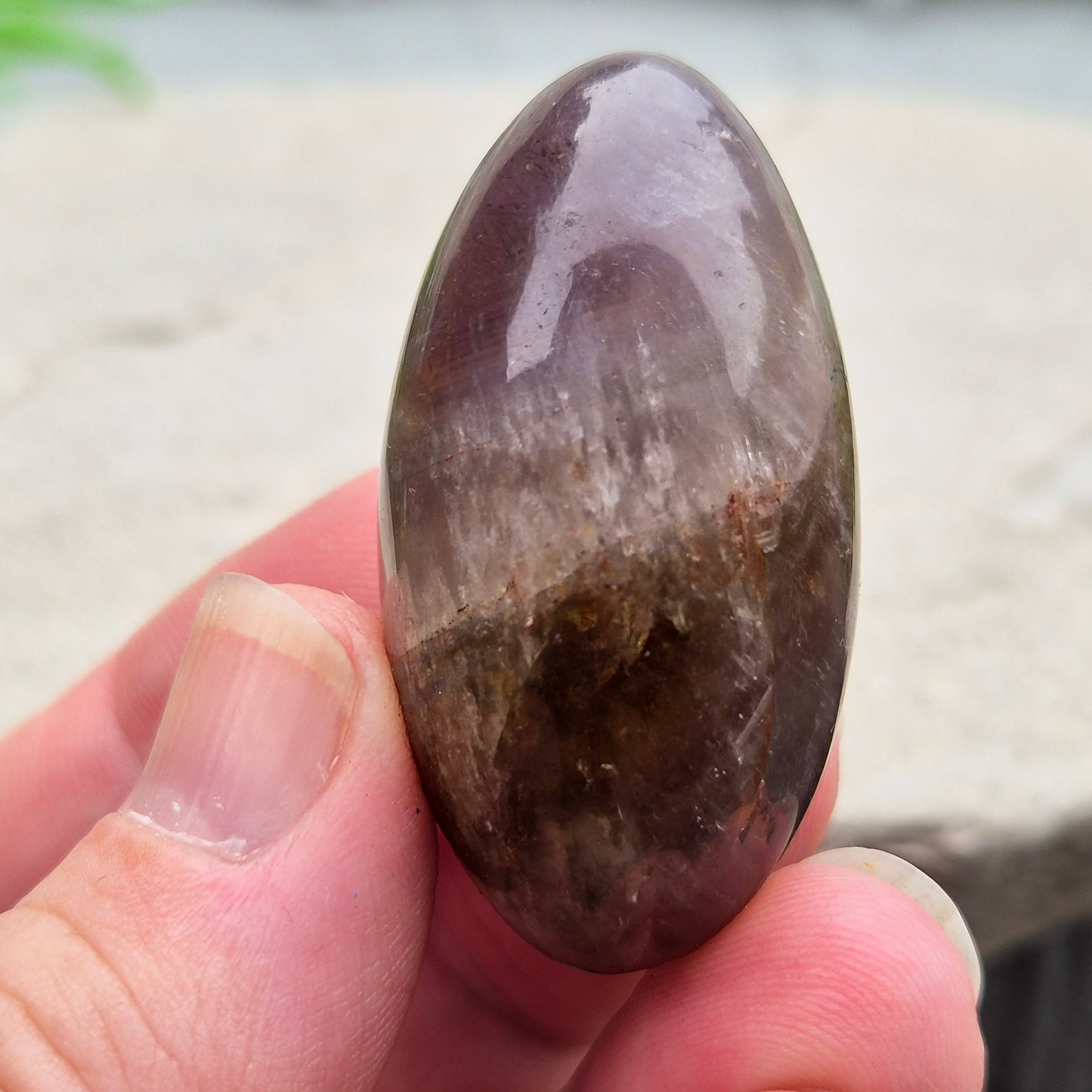 Ametrine polished palm stone with soft purple and golden tones. A natural blend of Amethyst and Citrine with a balanced, easy feel. 