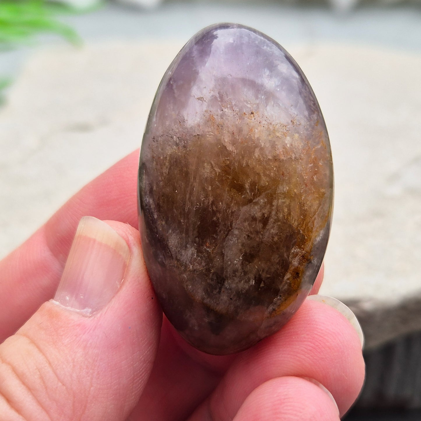 Ametrine polished palm stone with soft purple and golden tones. A natural blend of Amethyst and Citrine with a balanced, easy feel. 