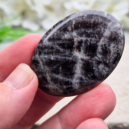 Black Moonstone, valued for its connection to the moon’s energy. Perfect for enhancing intuition, emotional healing, and balancing energy.