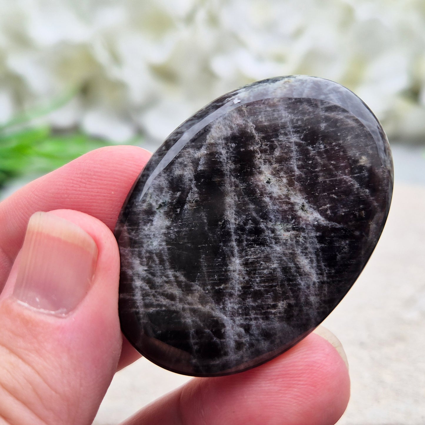 Black Moonstone, valued for its connection to the moon’s energy. Perfect for enhancing intuition, emotional healing, and balancing energy.