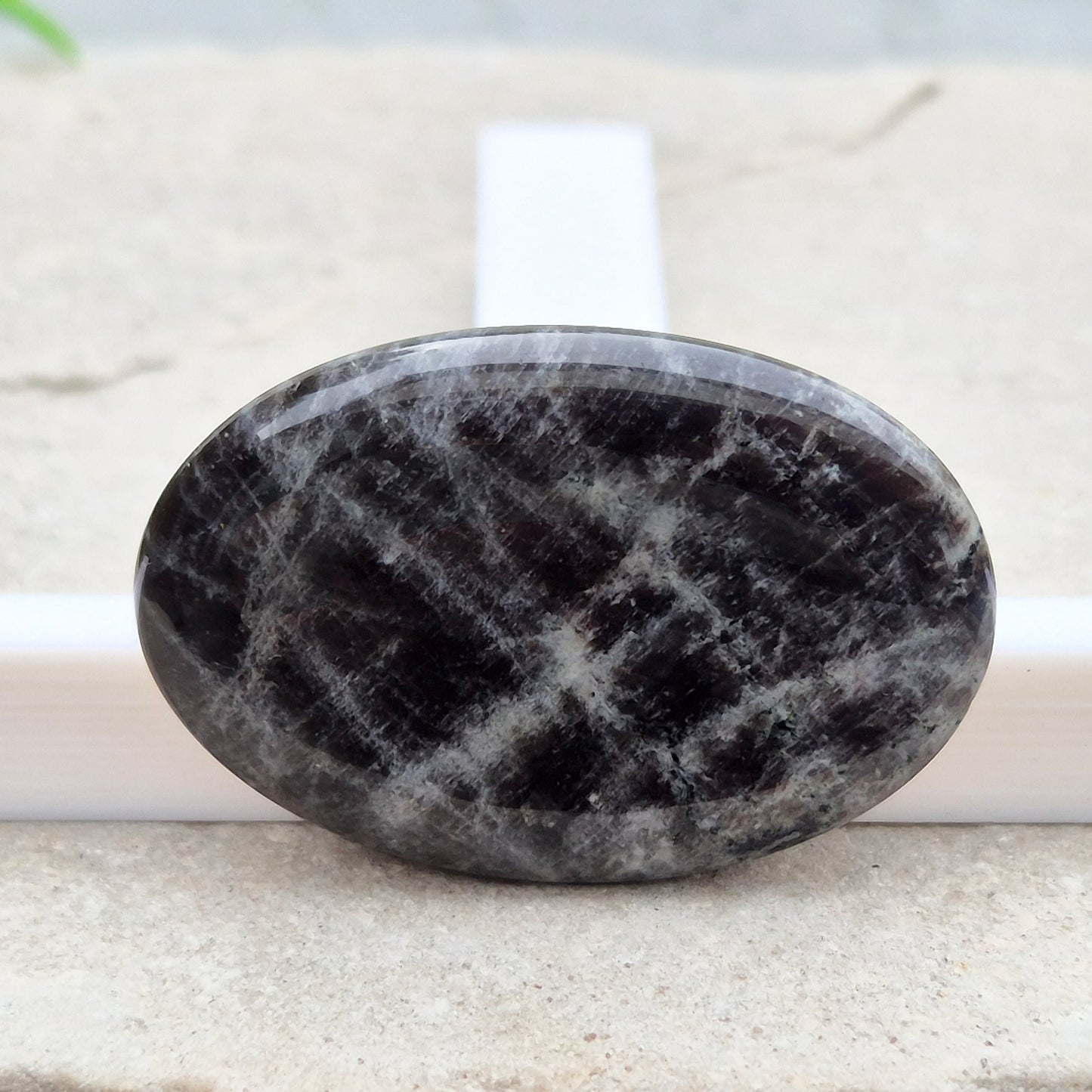 Black Moonstone, valued for its connection to the moon’s energy. Perfect for enhancing intuition, emotional healing, and balancing energy.