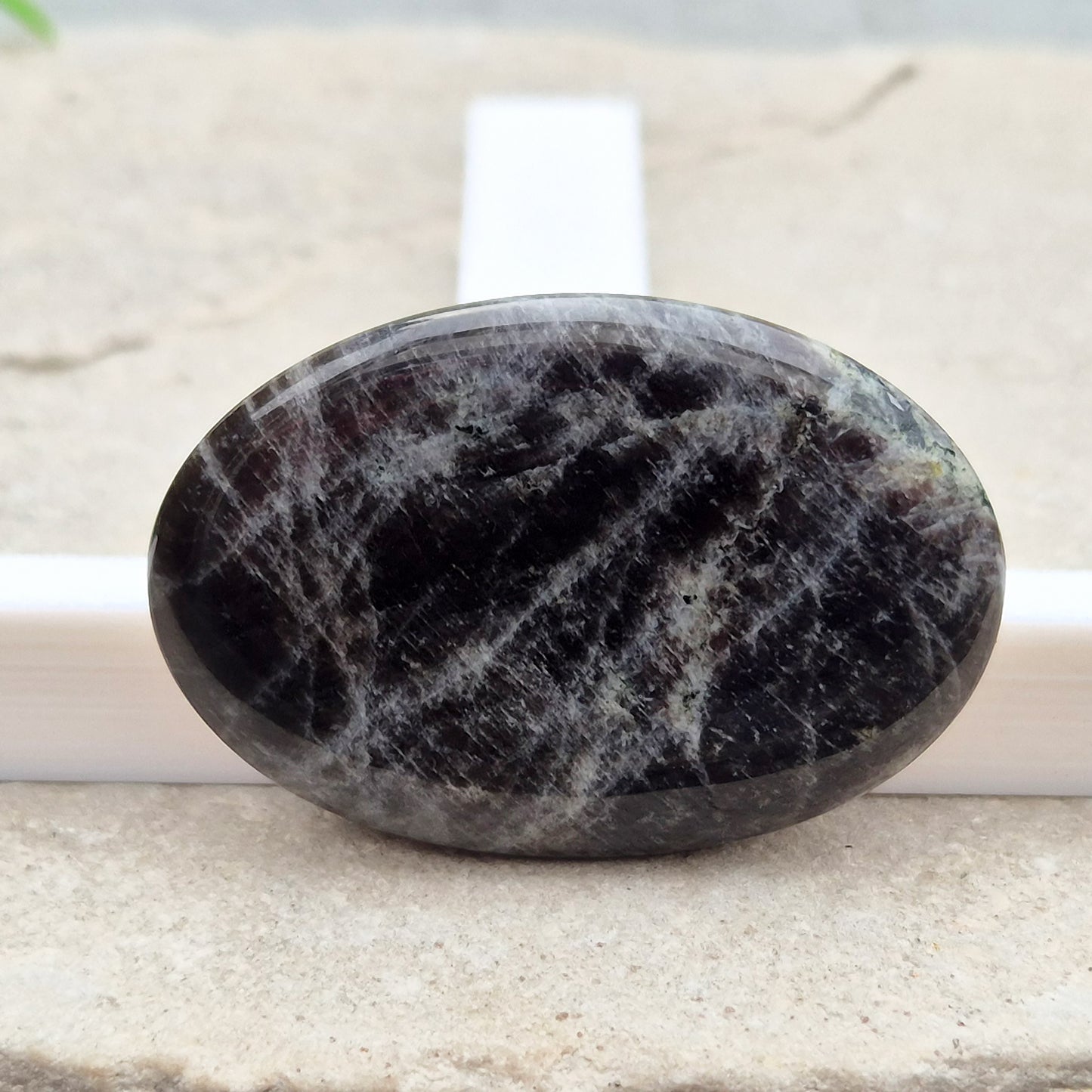 Black Moonstone, valued for its connection to the moon’s energy. Perfect for enhancing intuition, emotional healing, and balancing energy.