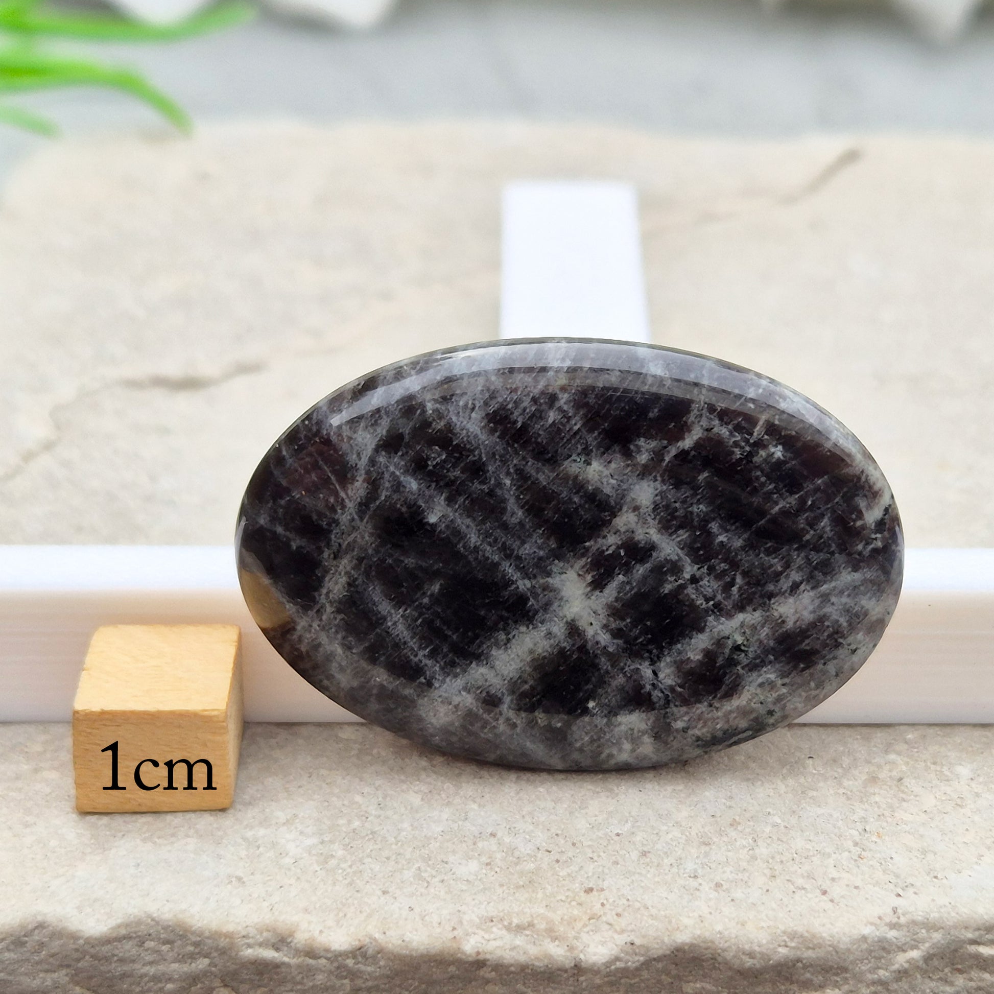 Black Moonstone, valued for its connection to the moon’s energy. Perfect for enhancing intuition, emotional healing, and balancing energy.