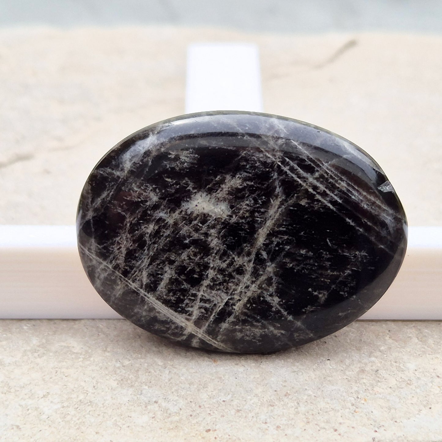 Black Moonstone, valued for its connection to the moon’s energy. Perfect for enhancing intuition, emotional healing, and balancing energy.