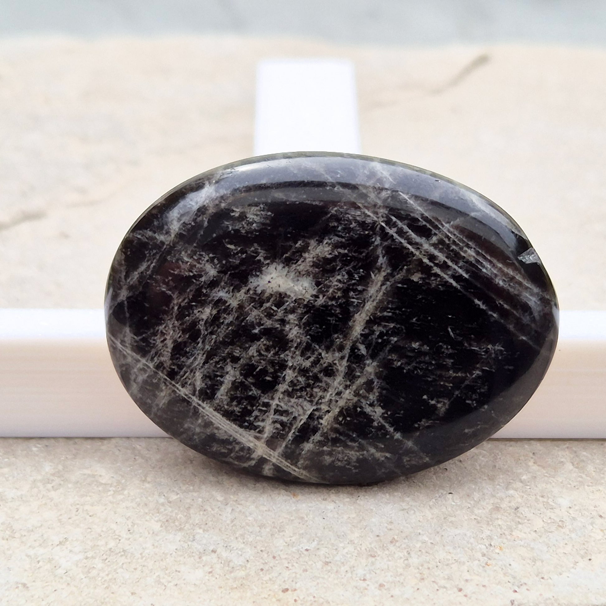 Black Moonstone, valued for its connection to the moon’s energy. Perfect for enhancing intuition, emotional healing, and balancing energy.