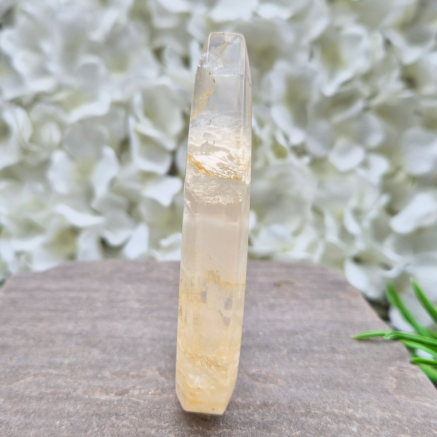 Golden Healer Quartz Teardrop – polished self-standing crystal with golden hematoid inclusions. Brazilian quartz for meditation, altars & spiritual guidance.