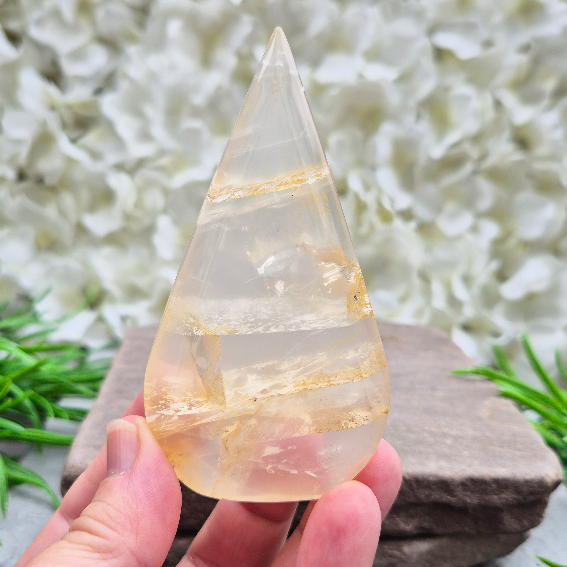Golden Healer Quartz Teardrop – polished self-standing crystal with golden hematoid inclusions. Brazilian quartz for meditation, altars & spiritual guidance.