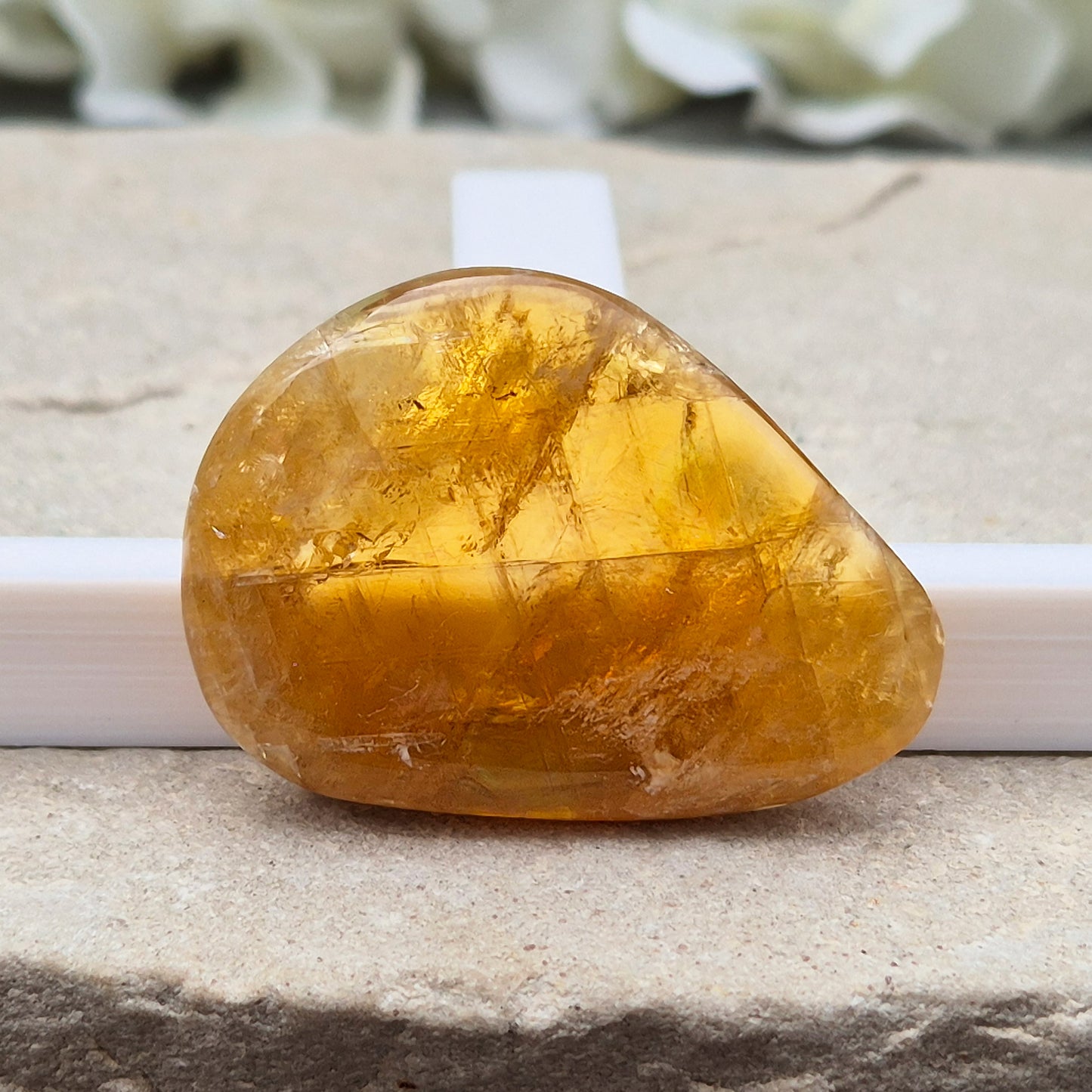 Shop Honey Calcite Palm Stones – smooth, pocket-sized crystals in rich honey tones. Perfect for meditation, mindfulness & everyday carry. UK crystal shop.