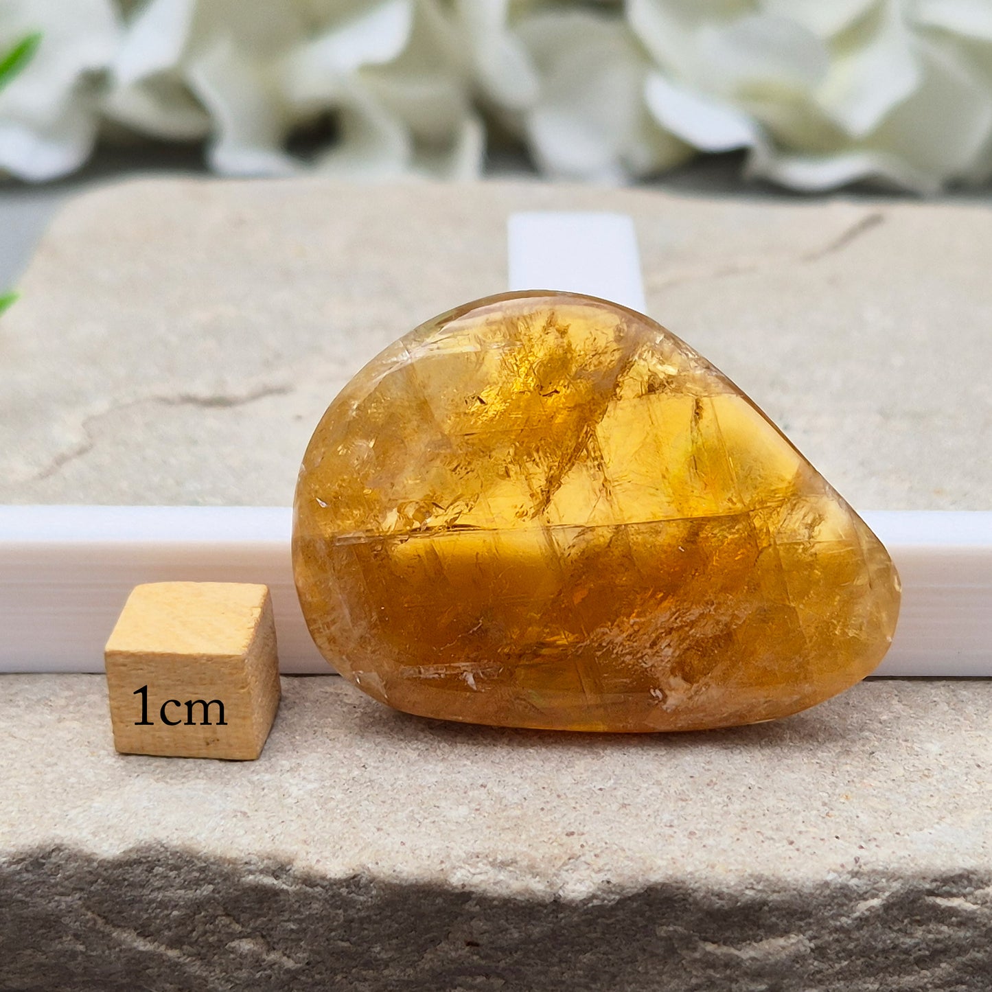 Shop Honey Calcite Palm Stones – smooth, pocket-sized crystals in rich honey tones. Perfect for meditation, mindfulness & everyday carry. UK crystal shop.