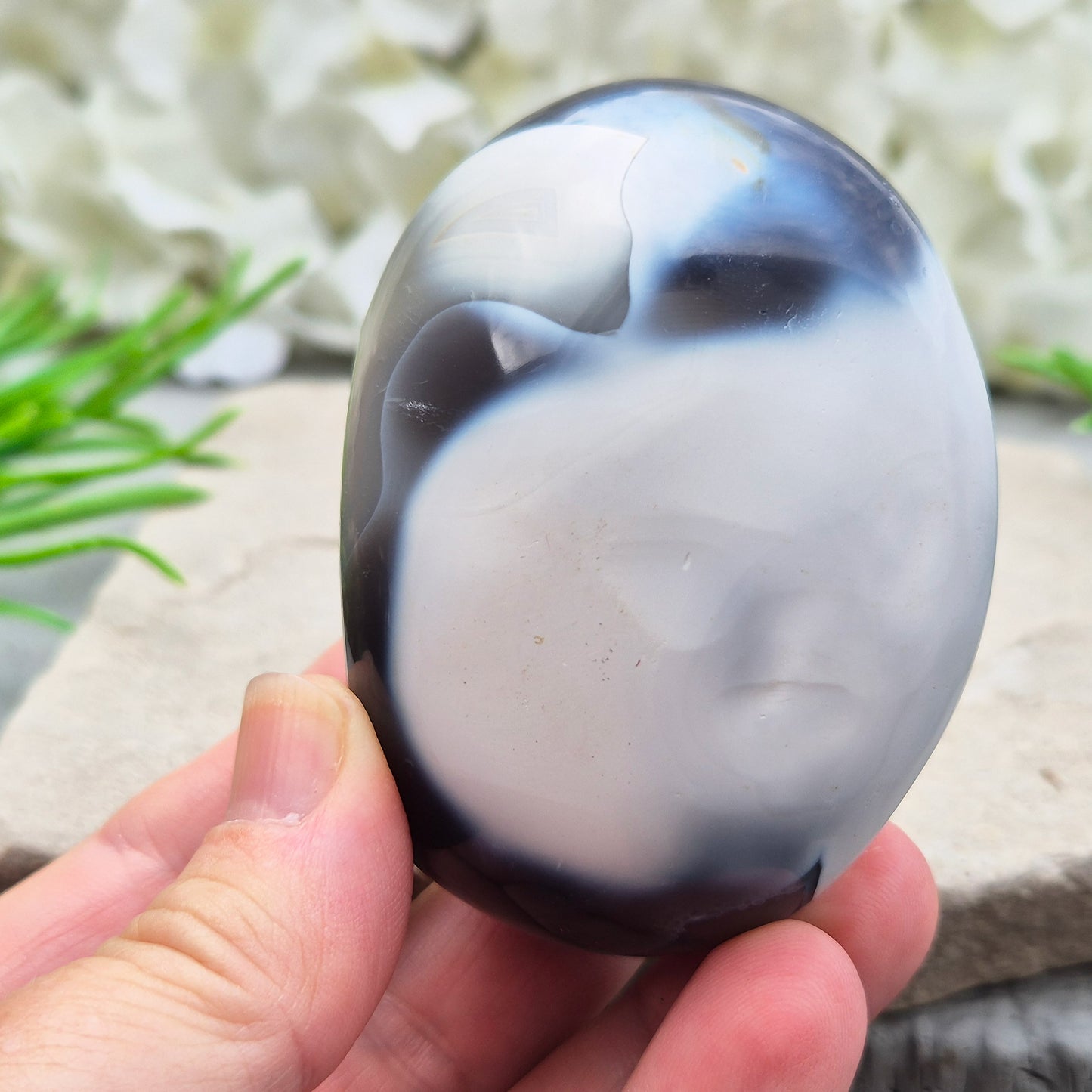 Orca Agate also known as Grey Agate, it has black, dark charcoal grey and white patterning, with soft, out-of-focus white markings as a natural feature of the stone. No two pieces show the same pattern and colouring.