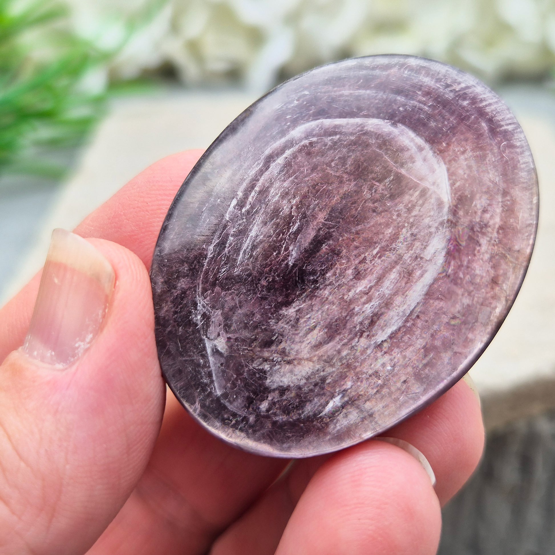Mica palm stone in shimmering metallic lilac. Perfect for holding, mindful energy, and gifting. Helps steady thoughts, balance emotions, and uplift.