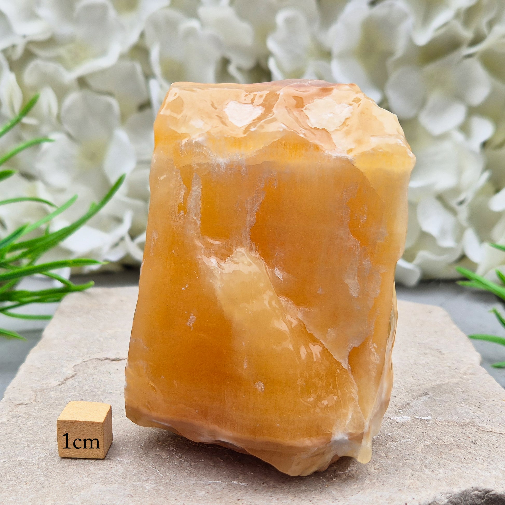 Natural Orange Calcite standing stone from Mexico. A warm, uplifting crystal for motivation, confidence, and brighter, more energised spaces.