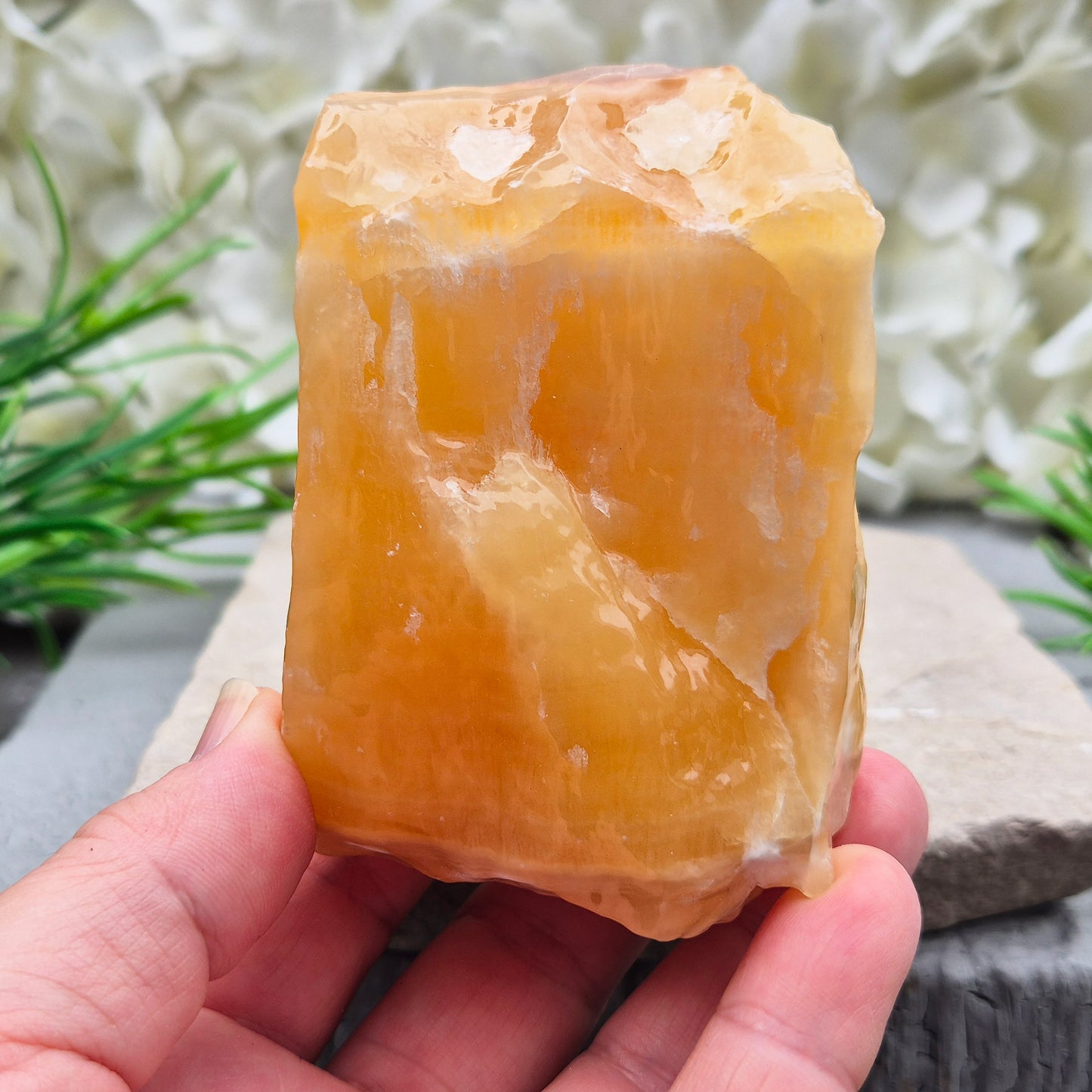 Natural Orange Calcite standing stone from Mexico. A warm, uplifting crystal for motivation, confidence, and brighter, more energised spaces.
