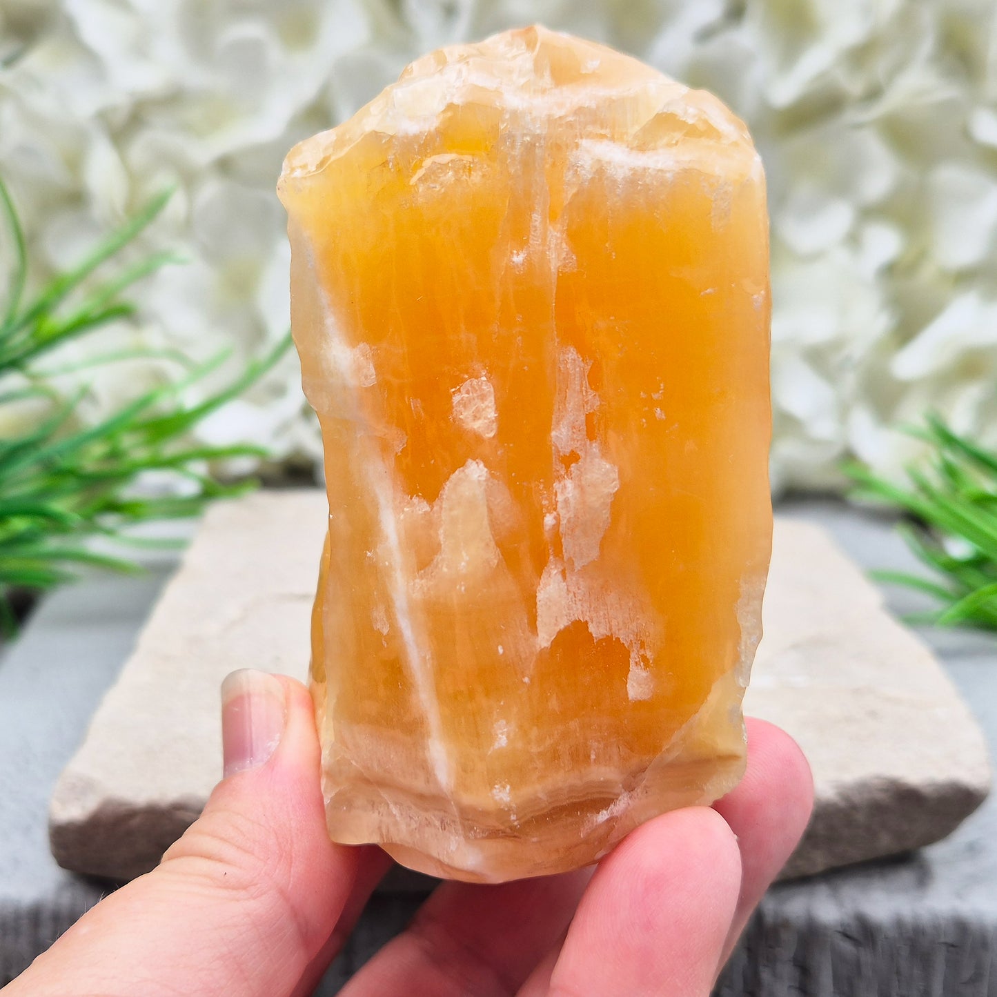 Natural Orange Calcite standing stone from Mexico. A warm, uplifting crystal for motivation, confidence, and brighter, more energised spaces.