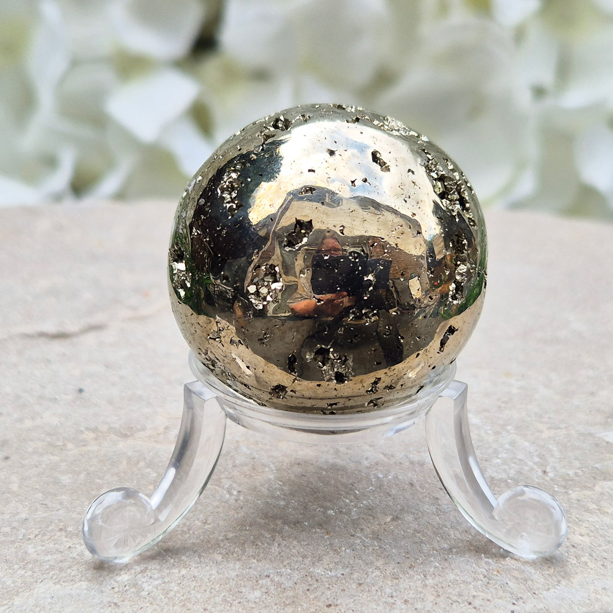genuine Pyrite crystal sphere from Peru. Known for confidence, motivation, protection, abundance, and energising workspace energy.