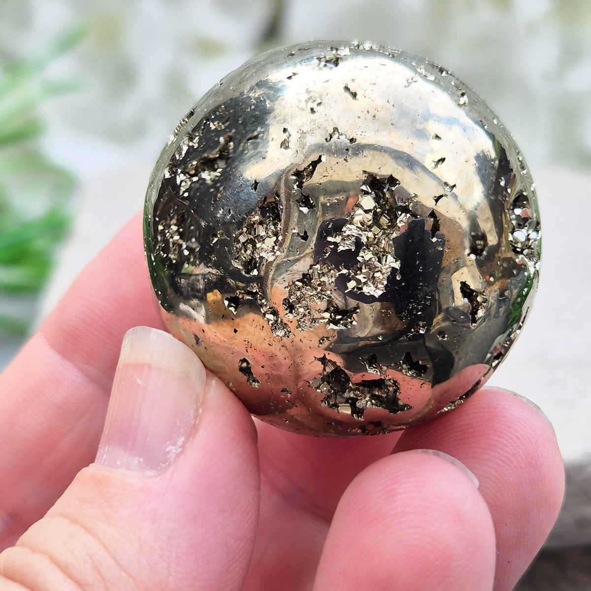 genuine Pyrite crystal sphere from Peru. Known for confidence, motivation, protection, abundance, and energising workspace energy.