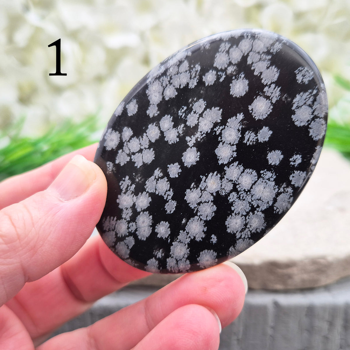 Snowflake Obsidian Palm Stone – grounding crystal for emotional balance, breaking patterns, steady protection. Smooth polished palm stone for everyday use.