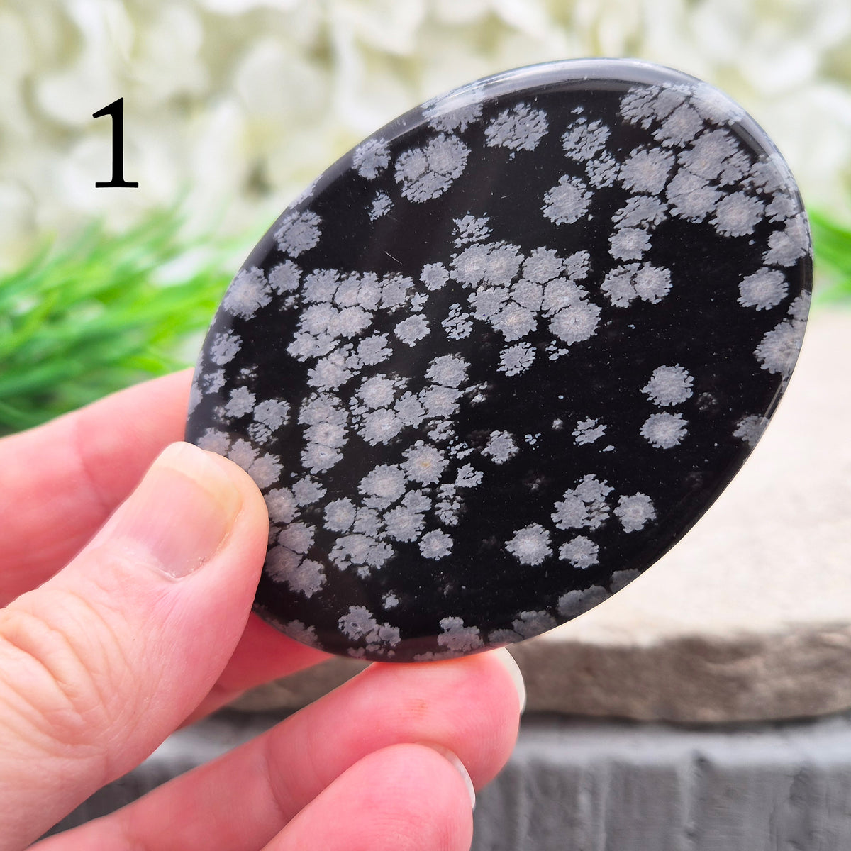 Snowflake Obsidian Palm Stone – grounding crystal for emotional balance, breaking patterns, steady protection. Smooth polished palm stone for everyday use.