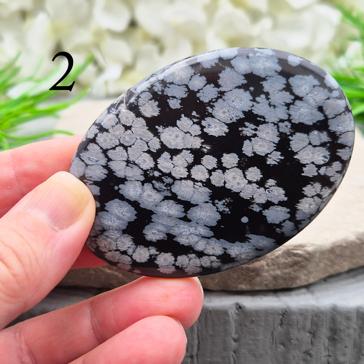 Snowflake Obsidian Palm Stone – grounding crystal for emotional balance, breaking patterns, steady protection. Smooth polished palm stone for everyday use.