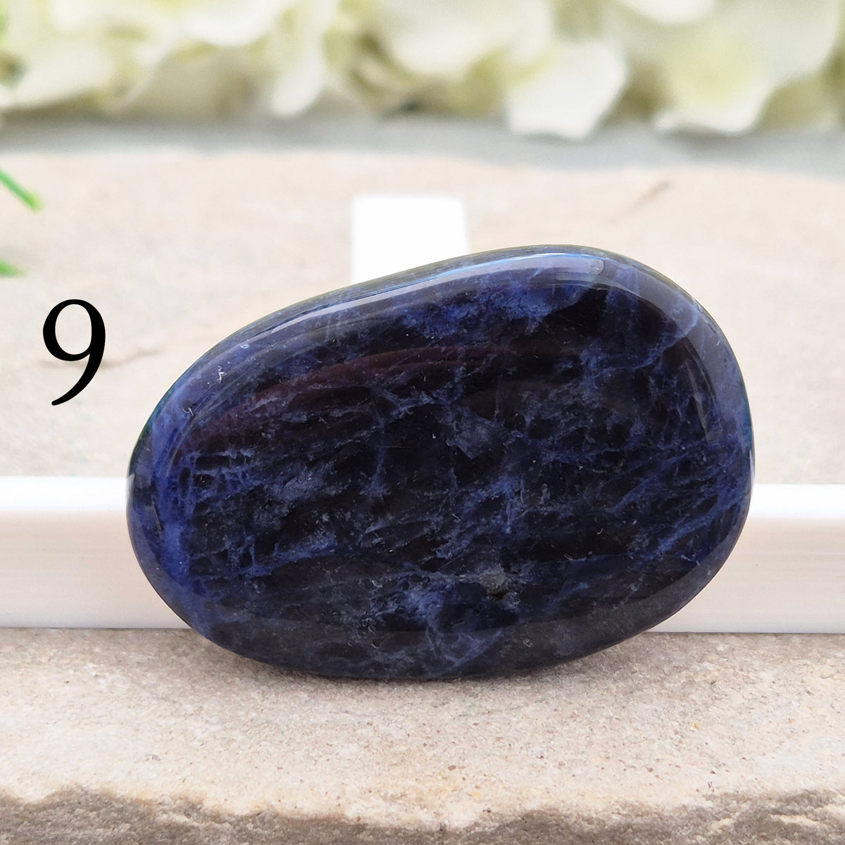 Beautiful A-grade Sodalite palm stone from Namibia. Supports clear thinking, confidence in communication, and emotional calm. Throat & Third Eye chakra crystal.