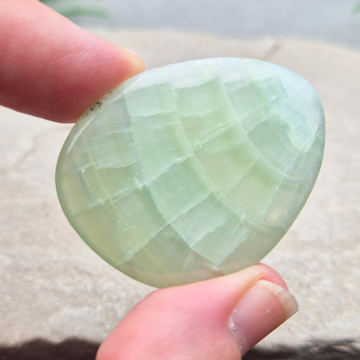 Pistachio Green Calcite palm stone soothes, restores balance, and encourages renewal. Perfect for meditation, emotional healing, and fresh energy flow.