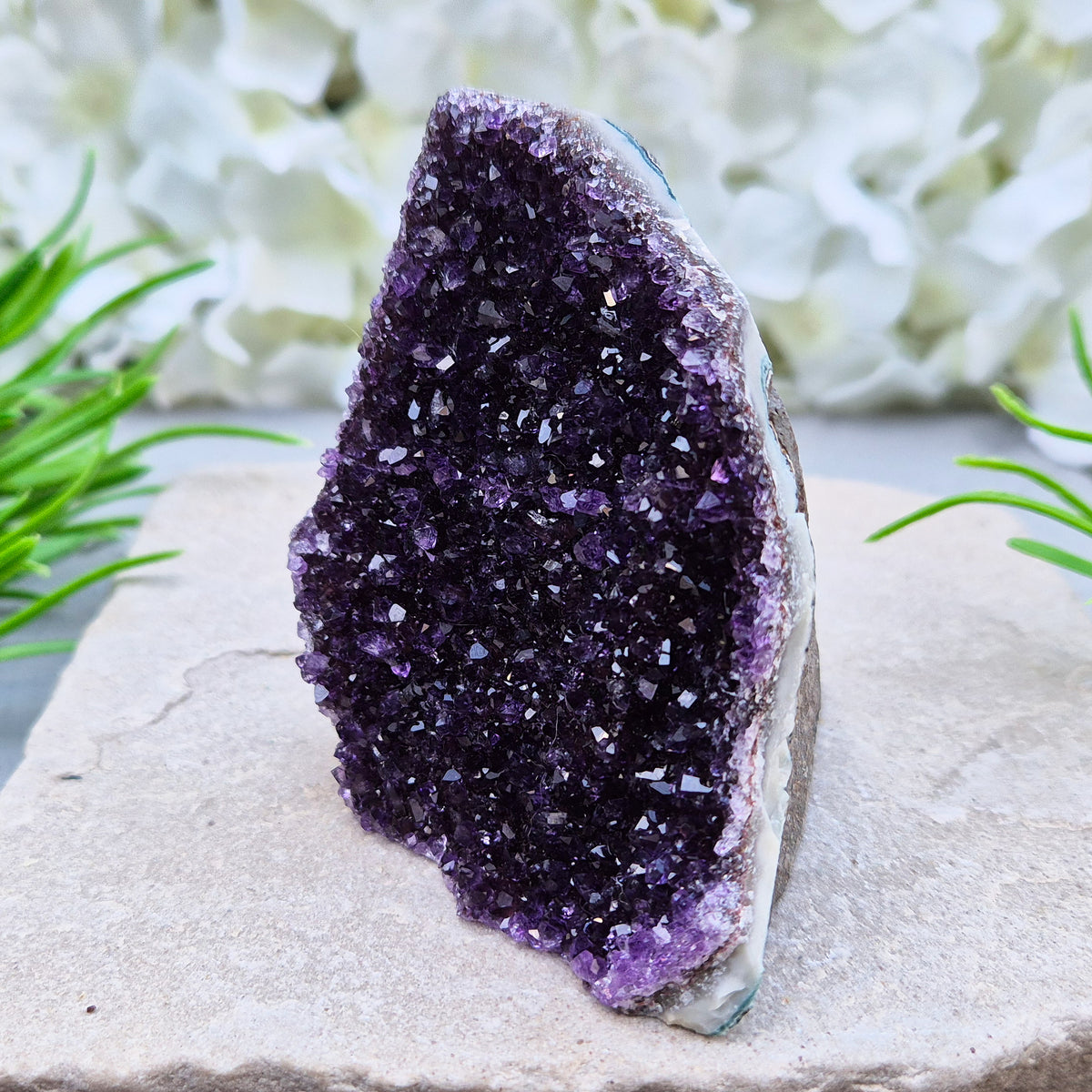Amethyst geode with sparkling deep purple points from Brazil. A self-standing display piece offering calm, clarity, protection, and strong spiritual presence.