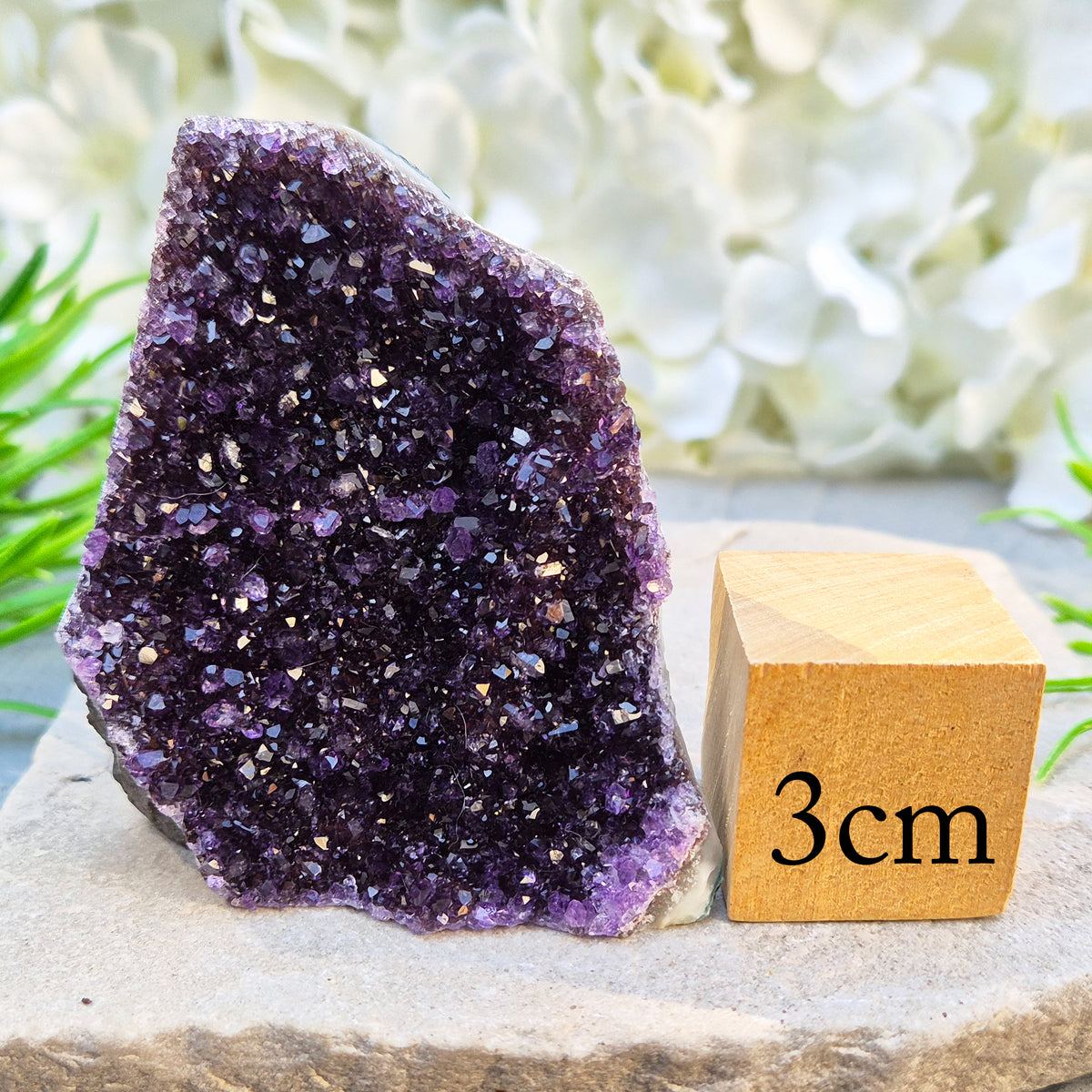 Amethyst geode with sparkling deep purple points from Brazil. A self-standing display piece offering calm, clarity, protection, and strong spiritual presence.