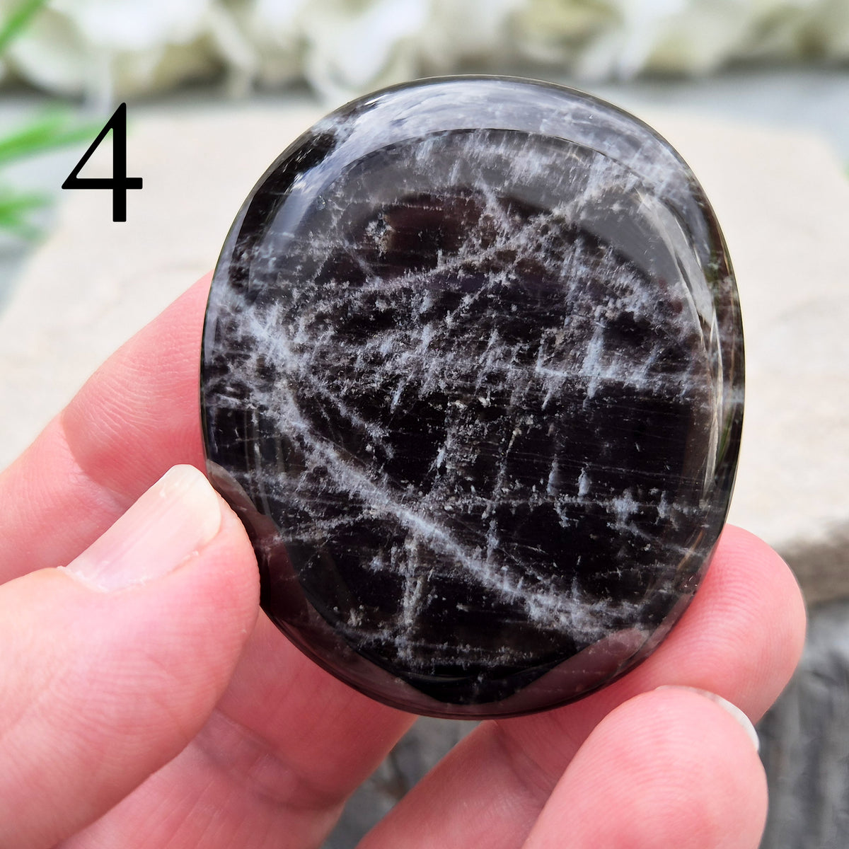 Black Moonstone Crystal Palm Stone, valued for its connection to the moon’s energy. Perfect for enhancing intuition, emotional healing, and balancing energy.