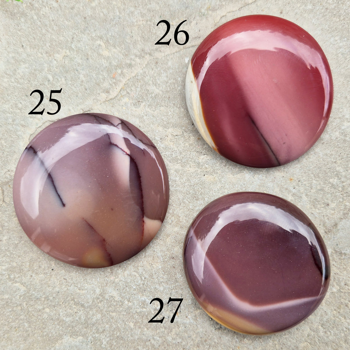 Mookaite palm stone from Western Australia. Supports change, confident choices and self-compassion. Smooth, pocket-sized crystal for meditation or gifting.