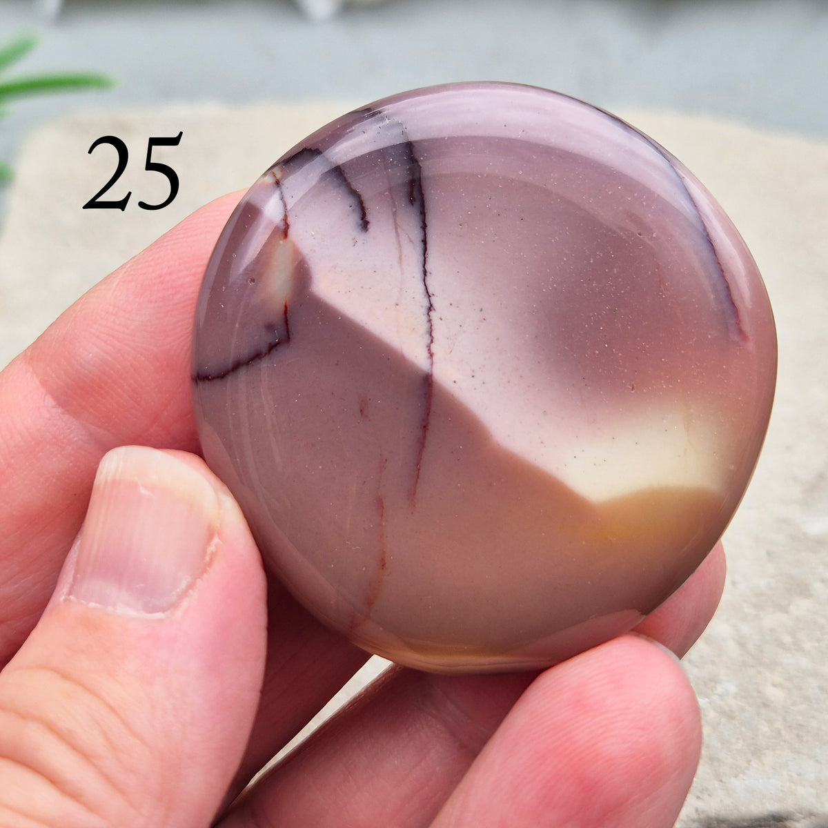 Mookaite palm stone from Western Australia. Supports change, confident choices and self-compassion. Smooth, pocket-sized crystal for meditation or gifting.