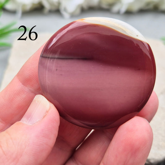 Mookaite palm stone from Western Australia. Supports change, confident choices and self-compassion. Smooth, pocket-sized crystal for meditation or gifting.