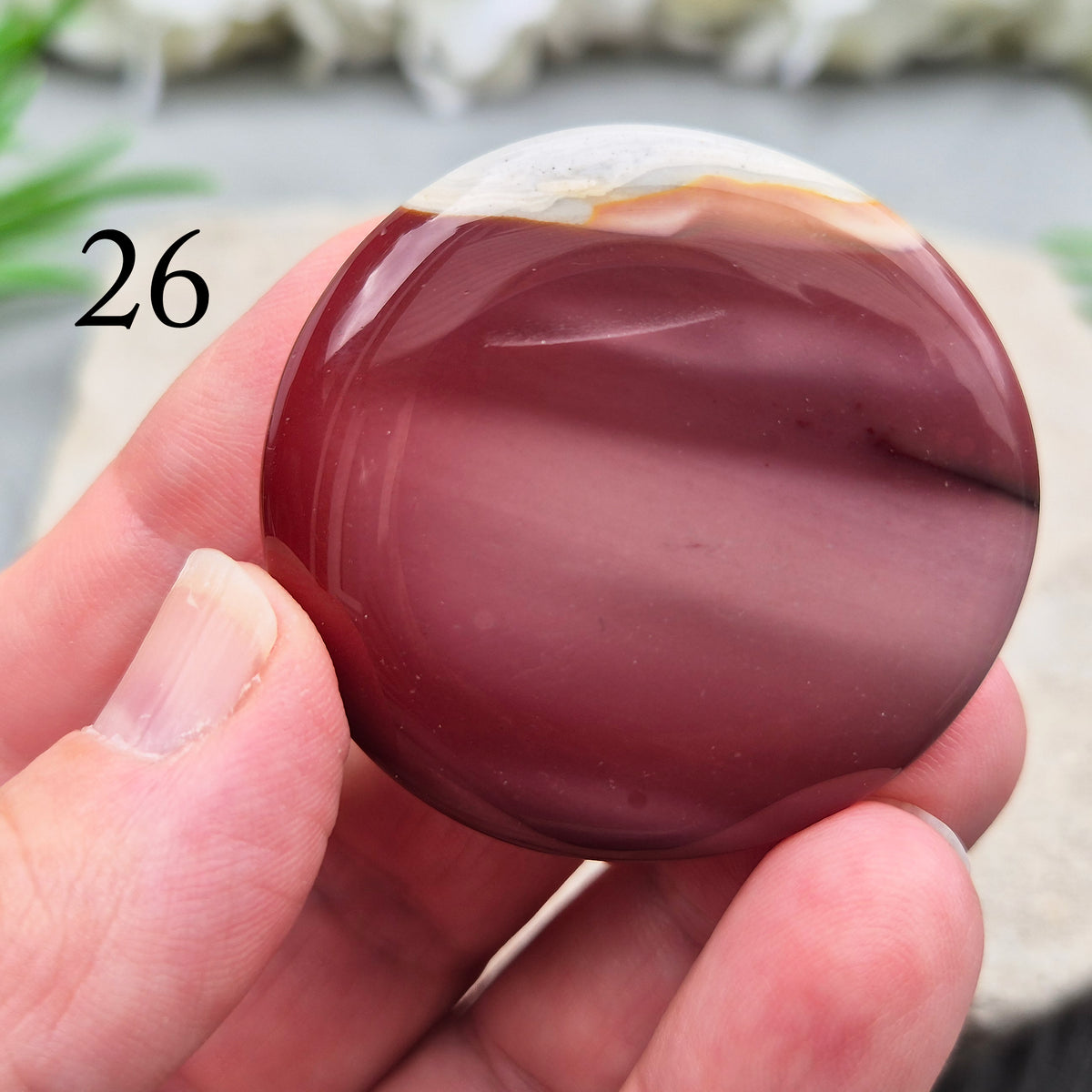 Mookaite palm stone from Western Australia. Supports change, confident choices and self-compassion. Smooth, pocket-sized crystal for meditation or gifting.