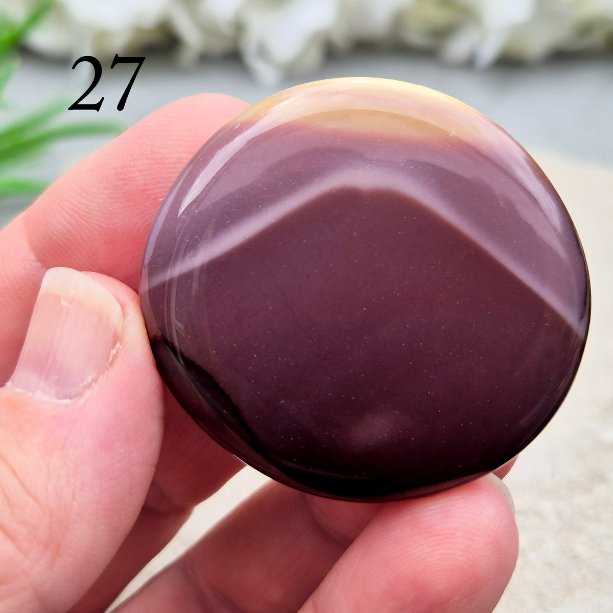 Mookaite palm stone from Western Australia. Supports change, confident choices and self-compassion. Smooth, pocket-sized crystal for meditation or gifting.