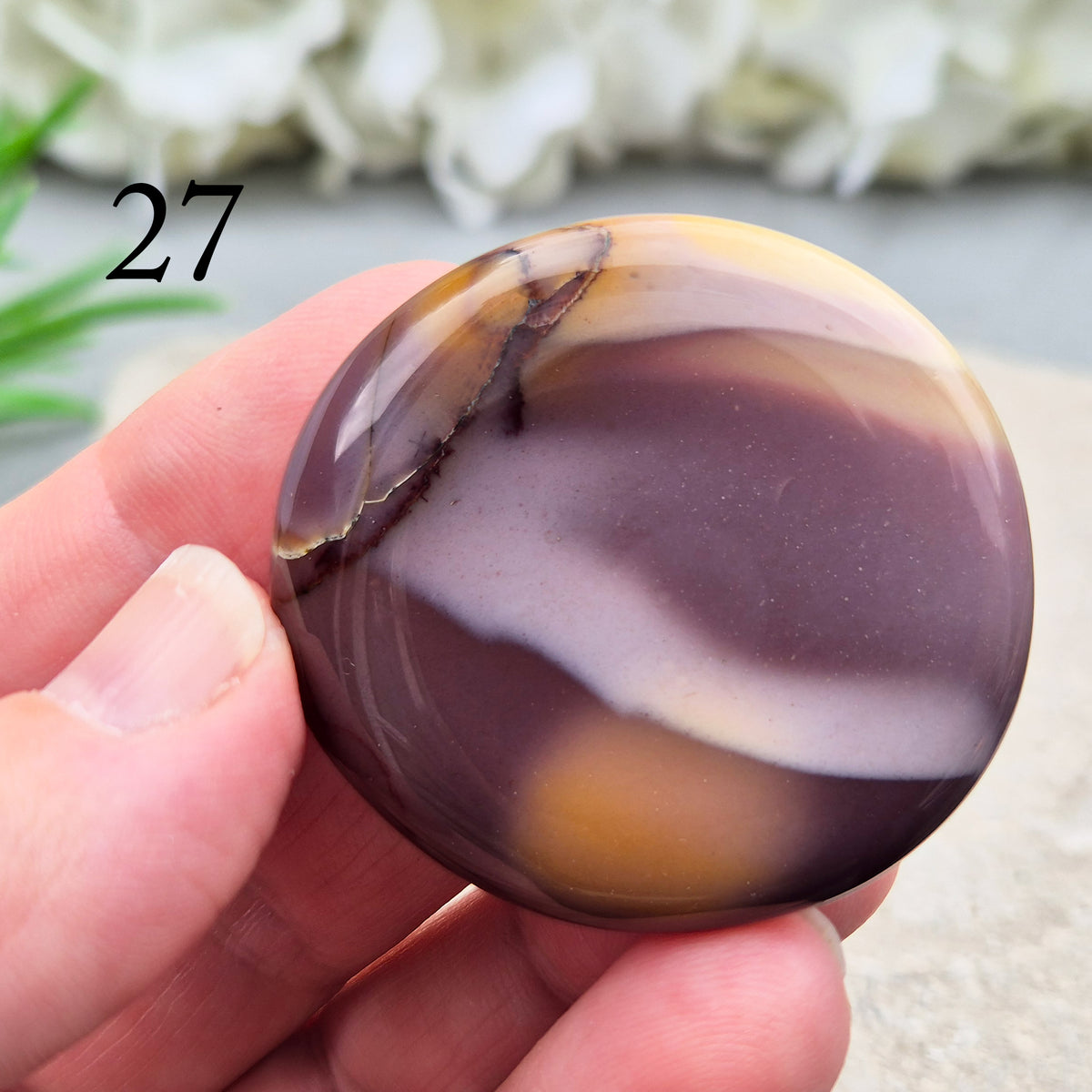 Mookaite palm stone from Western Australia. Supports change, confident choices and self-compassion. Smooth, pocket-sized crystal for meditation or gifting.
